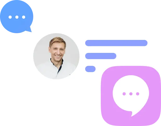 Dentist smiling in a professional setting, representing patient consultations and dental care services at La Clínica Dental Roma.